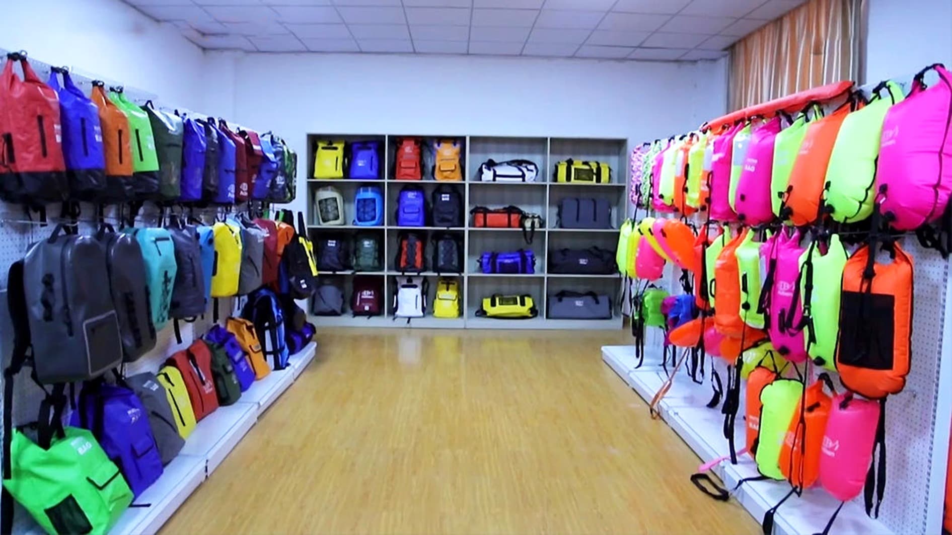 Sample room displaying waterproof bags and backpacks